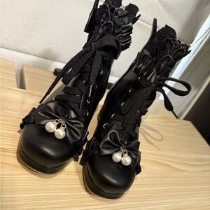 Chic Black Lace-Up Boots with Pearl Accent